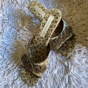 Slip on sandal with small heel